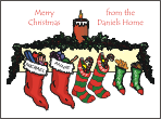 Stockings hanging on a mantle Christmas Cards